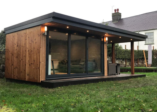An Office Garden Room extension with large side canopy sitting area
