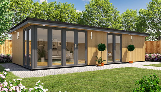 A Rubicon Garden Rooms building with glass doors, and an Annexe Style Bespoke lawn designed for independent living.