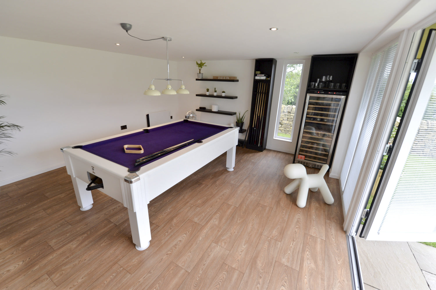 A pool table in a room.