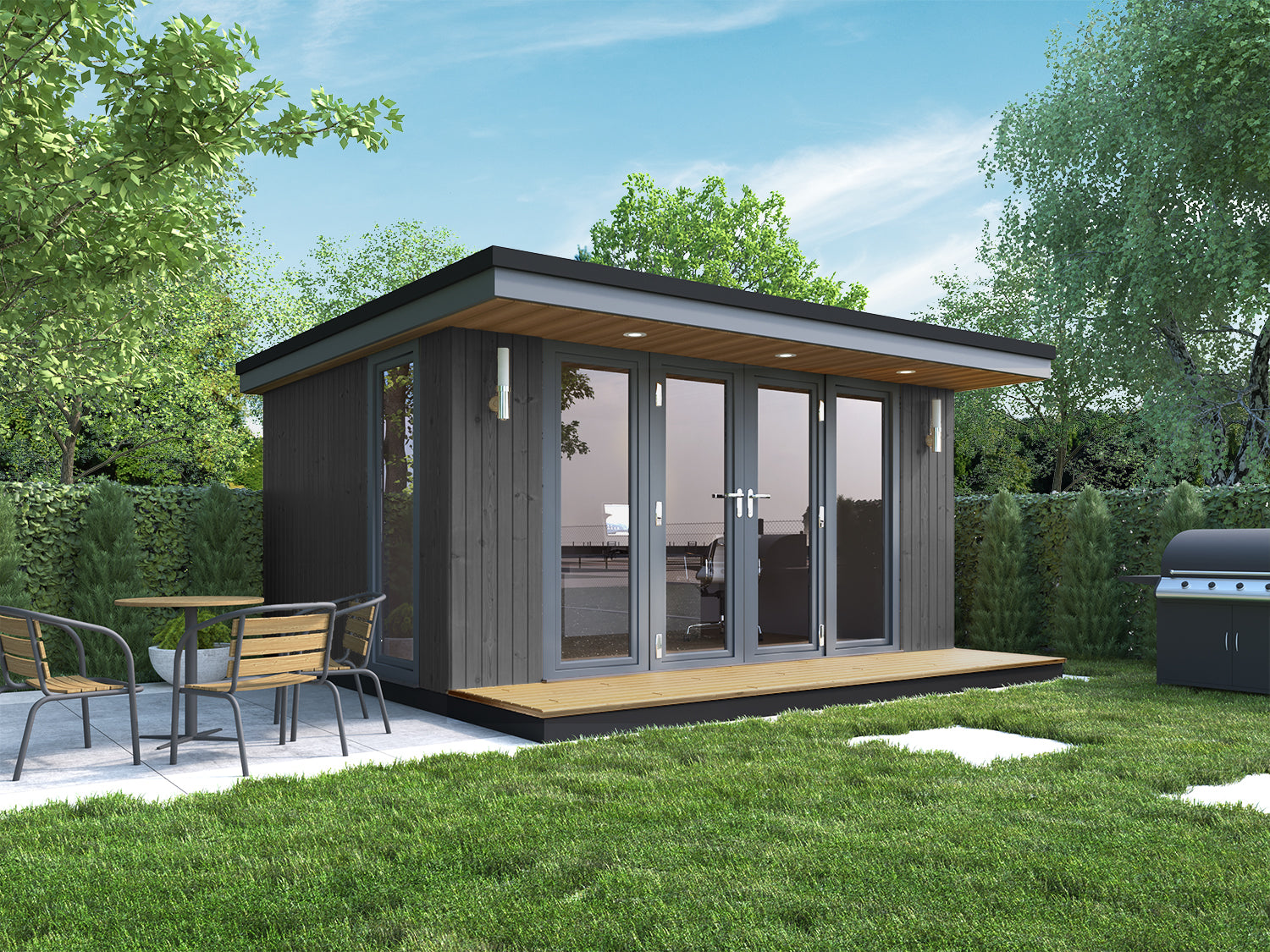 A garden room in black composite cladding