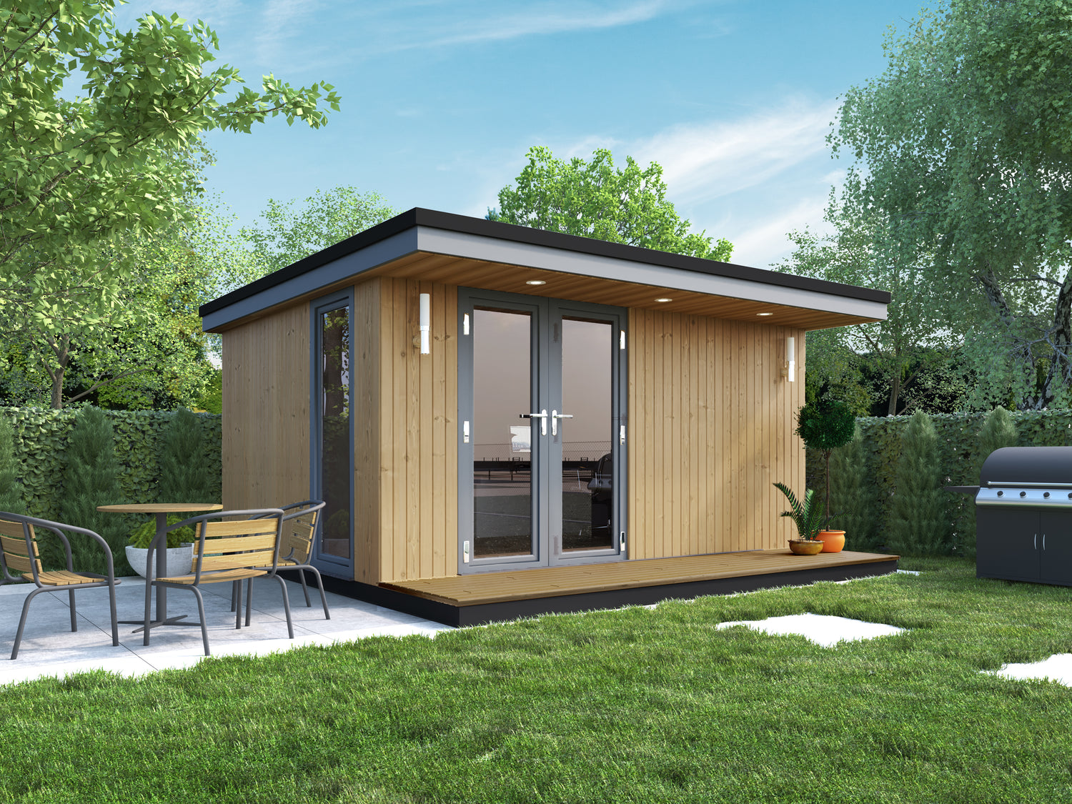 A contemporary garden room office with a front canopy and table and chairs.