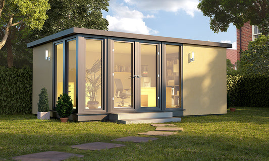 A small office building in a yard featuring a Vista Style self-coloured render by Rubicon Garden Rooms.