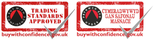 Two red and white badges with the words'buy confidence' and'trading standards approved'.