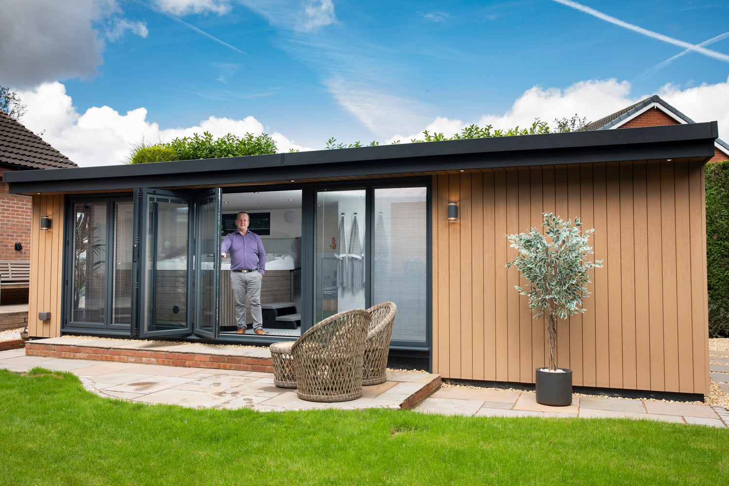 A garden room office in Liverpool with spa bath and bi fold doors