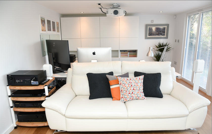 A white couch in a living room.