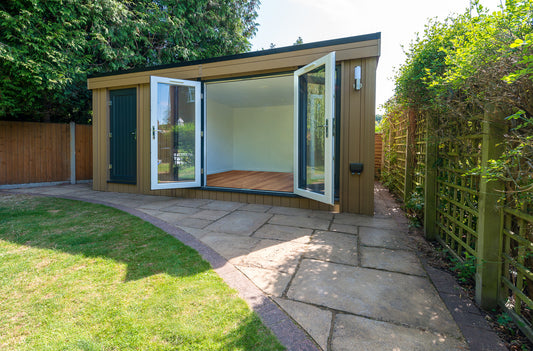 A Rubicon Garden Rooms Combi Style shed with a door open.