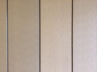 A close up view of a wooden wall.